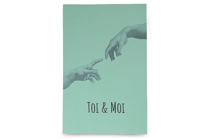 Carte postale cuir Toi & moi – La création d’Adam
